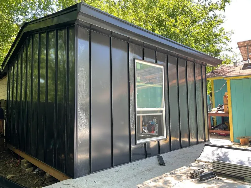 Black standing seam metal wall panels for Metal Roof Installation in Oak Park